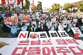 CORRECTED: Anti-Trump rally in S. Korea