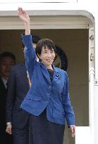 Japan PM Takaichi arrives in Busan