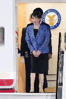 Japan PM Takaichi returns home