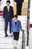 Japan PM Takaichi returns home