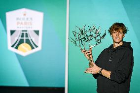 Jannik Sinner poses with Rolex Paris Masters 2025 trophy in Paris FA