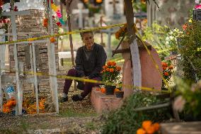 People Visit Cemeteries on the Day of the Dead - Mexico