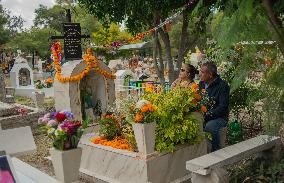 People Visit Cemeteries on the Day of the Dead - Mexico