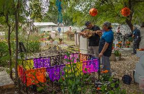 People Visit Cemeteries on the Day of the Dead - Mexico