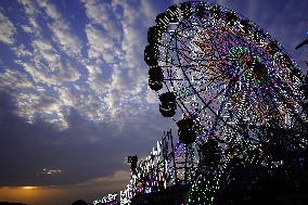 Illustration - Illuminated View Of Swings - Pushkar