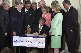 Bush Signs $1.35 Trillion Tax Cut Bill