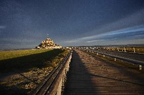 Mont-Saint-Michel and its bay in northwestern France. FC