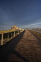 Mont-Saint-Michel and its bay in northwestern France. FC