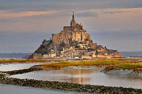 Mont-Saint-Michel and its bay in northwestern France. FC