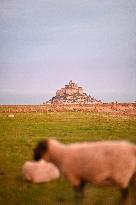 Mont-Saint-Michel and its bay in northwestern France. FC
