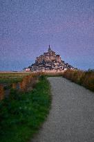 Mont-Saint-Michel and its bay in northwestern France. FC