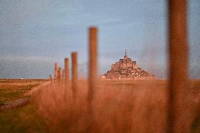 Mont-Saint-Michel and its bay in northwestern France. FC