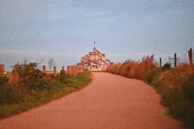 Mont-Saint-Michel and its bay in northwestern France. FC
