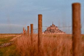 Mont-Saint-Michel and its bay in northwestern France. FC
