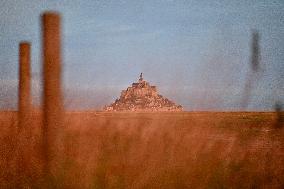 Mont-Saint-Michel and its bay in northwestern France. FC