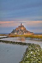 Mont-Saint-Michel and its bay in northwestern France. FC