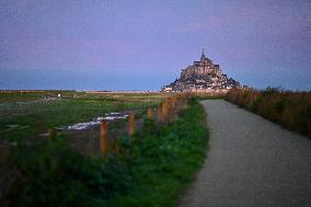 Mont-Saint-Michel and its bay in northwestern France. FC