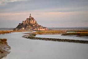 Mont-Saint-Michel and its bay in northwestern France. FC
