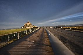 Mont-Saint-Michel and its bay in northwestern France. FC