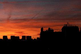 Sunset Over the Rooftops of Residential Buildings - Paris