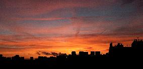 Sunset Over the Rooftops of Residential Buildings - Paris