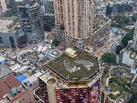 Giant Footprints on Building Rooftop in Chongqing