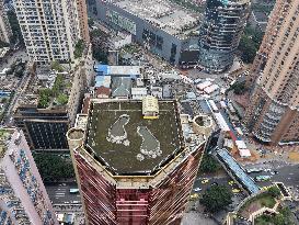 Giant Footprints on Building Rooftop in Chongqing