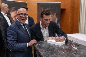 Jordan Bardella signs copies of his book Ce que veulent les Français - Nice