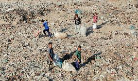 Gaza Scrap Search Amid Crisis