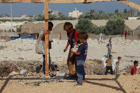 Gaza Scrap Search Amid Crisis