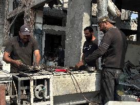 Gaza Man Rebuilds Bombed Bakery - Gaza Strip