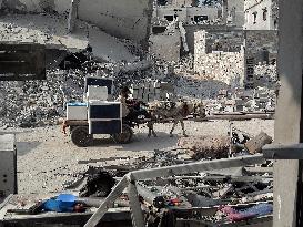 Gaza Man Rebuilds Bombed Bakery - Gaza Strip