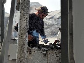 Gaza Man Rebuilds Bombed Bakery - Gaza Strip