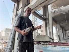 Gaza Man Rebuilds Bombed Bakery - Gaza Strip