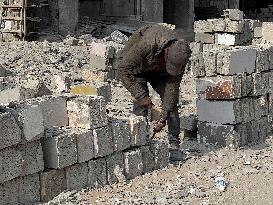 Gaza Man Rebuilds Bombed Bakery - Gaza Strip