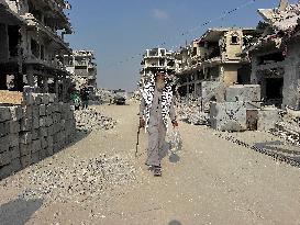 Gaza Man Rebuilds Bombed Bakery - Gaza Strip