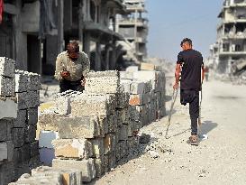 Gaza Man Rebuilds Bombed Bakery - Gaza Strip