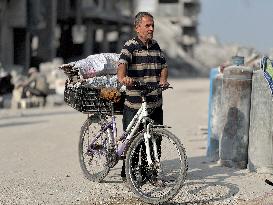 Gaza Man Rebuilds Bombed Bakery - Gaza Strip