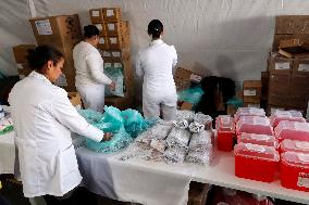 Vaccination Program Against Covid-19 and Influenza - Mexico City