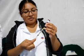 Vaccination Program Against Covid-19 and Influenza - Mexico City
