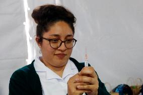 Vaccination Program Against Covid-19 and Influenza - Mexico City