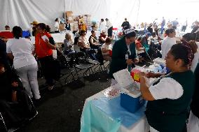 Vaccination Program Against Covid-19 and Influenza - Mexico City
