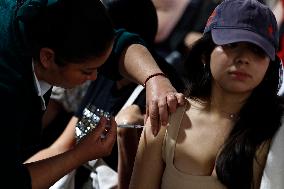 Vaccination Program Against Covid-19 and Influenza - Mexico City