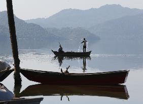 Fishermen in Phangota Lake - India