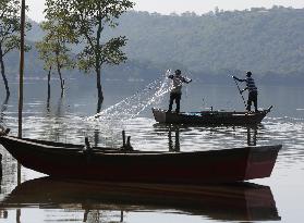 Fishermen in Phangota Lake - India