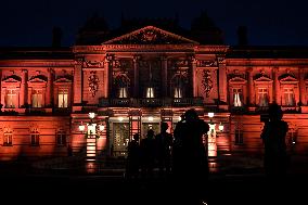 State Guest House lit in orange