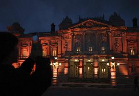 State Guest House lit in orange