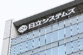 Hitachi Systems signboard and logo
