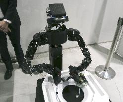 Hitachi robot engages in wiring work