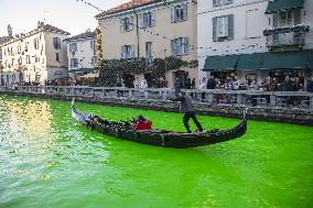 Extinction Rebellion Blitz Paints Navigli and Darsena Canals Green To Protest Against Climate Change - Italy